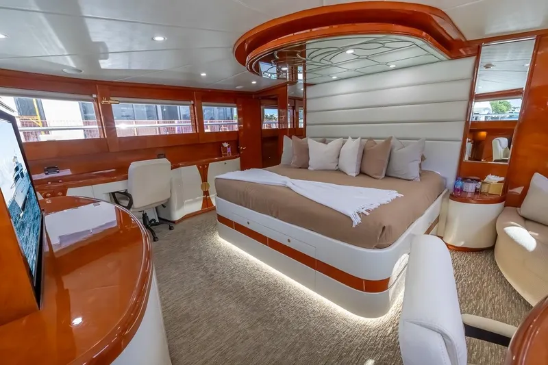Slide: The Image of Luxurious interior of 2003 Johnson 87' Motor Yacht with elegant bedroom design. - 60