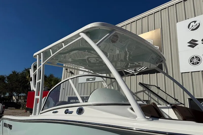 Slide: The Image of 2026 Sea Pro 240 Dual Console boat with sleek design and sturdy T-top. - 4