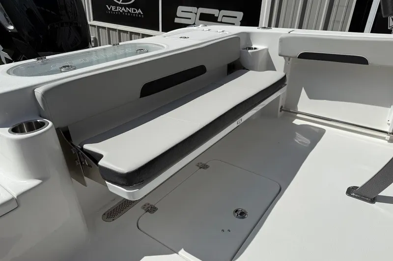 Slide: The Image of 2026 Sea Pro 242 Center Console boat interior with seating and storage. - 21