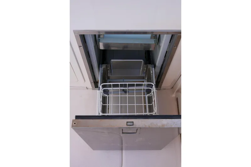 Slide: The Image of Open drawer on 2014 Grady-White Freedom 307 boat, showcasing storage compartment. - 24