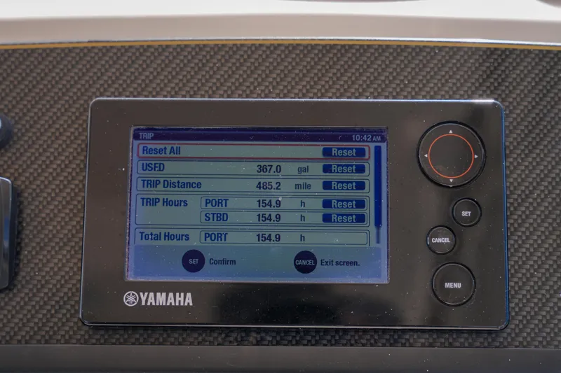 Slide: The Image of Yamaha display on 2014 Grady-White Freedom 307 showing trip data and settings. - 37