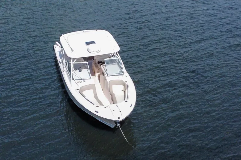 Slide: The Image of 2014 Grady-White Freedom 307 boat on calm water, aerial view. - 5