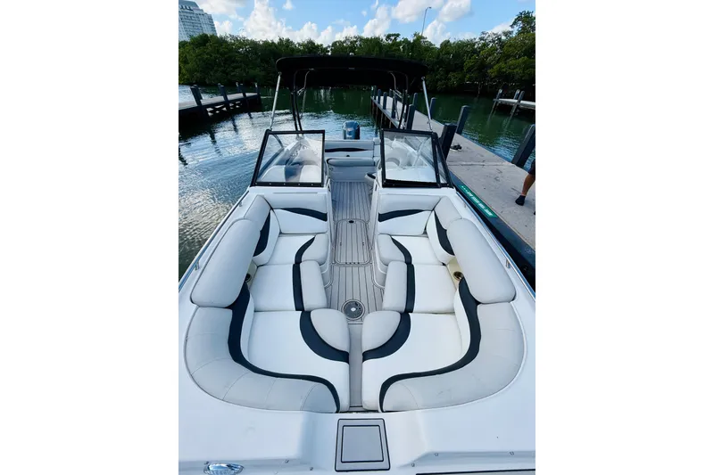 Slide: The Image of 2015 Starcraft Crossover 250 SCX OB boat with spacious seating and sleek design. - 25