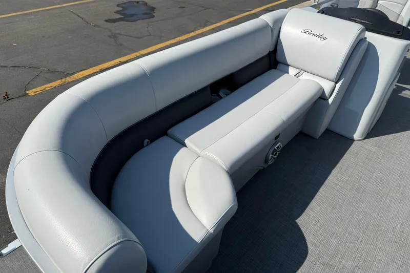 Slide: The Image of 2022 Bentley Pontoons 240 CRUISE with luxurious gray seating on a pontoon boat. - 10