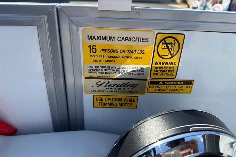 Slide: The Image of 2022 Bentley Pontoons 240 CRUISE capacity label, 16 persons, 2720 lbs, safety warnings. - 15