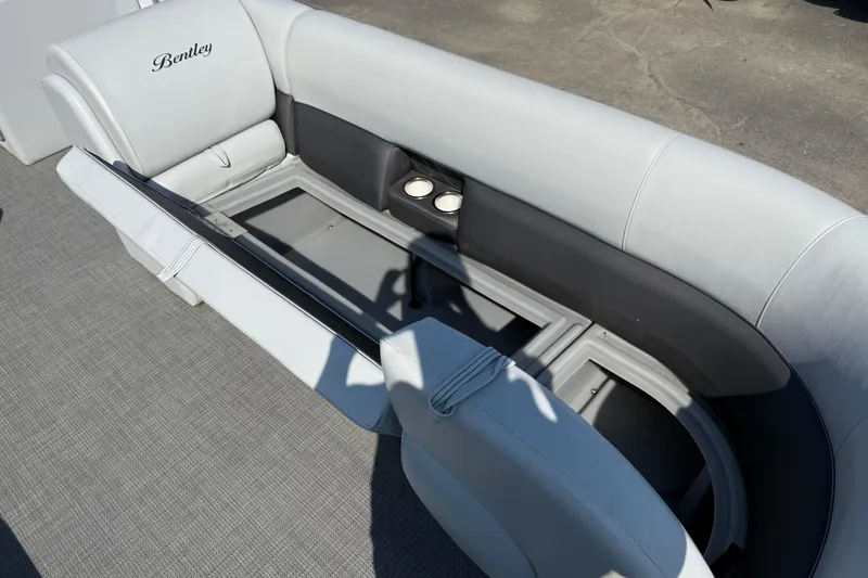 Slide: The Image of 2022 Bentley Pontoons 240 CRUISE interior seating with storage compartment open. - 20
