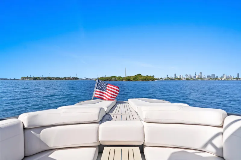 Slide: The Image of Luxury yacht Princess R35, 2020 model, with American flag on open water. - 11