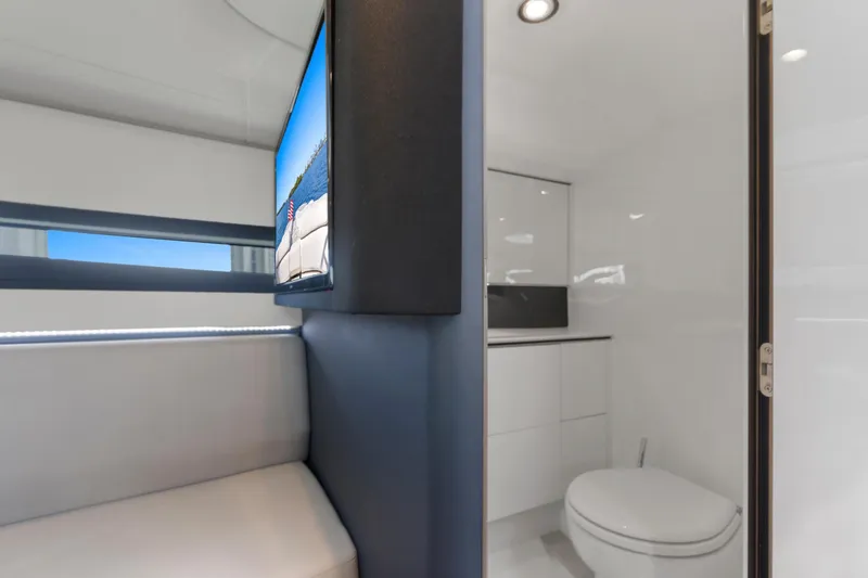 Slide: The Image of Luxurious interior of 2020 Princess R35 yacht featuring modern bathroom and seating area. - 27