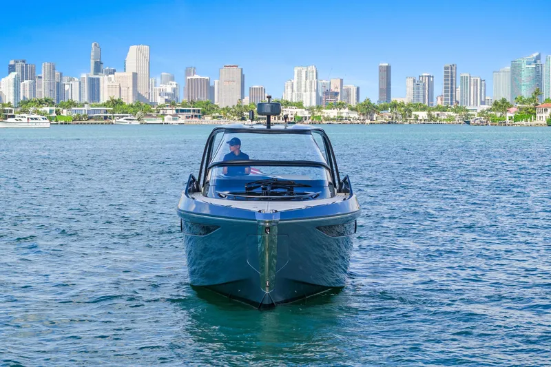 Slide: The Image of 2020 Princess R35 yacht cruising near city skyline on a sunny day. - 6