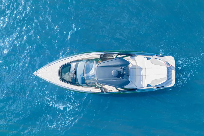 Slide: The Image of Aerial view of 2020 Princess R35 yacht cruising on clear blue water. - 9