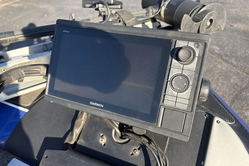 Slide: The Image of Garmin navigation system on 2021 Caymas CX20 boat dashboard. - 10