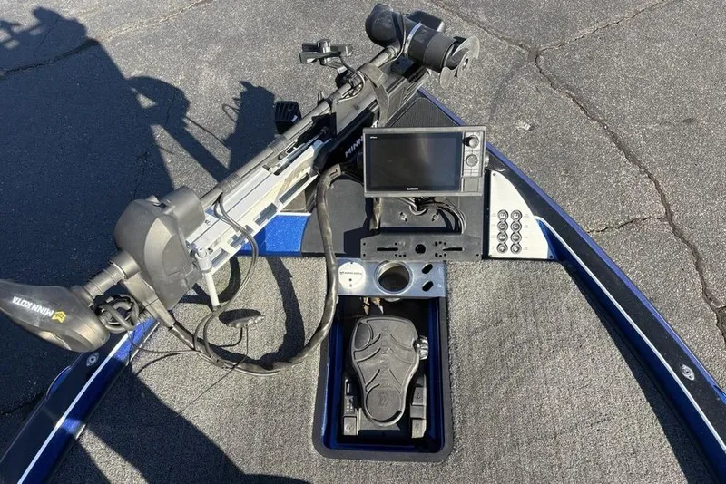 Slide: The Image of 2021 Caymas CX20 boat dashboard with Garmin display and Minn Kota trolling motor. - 12