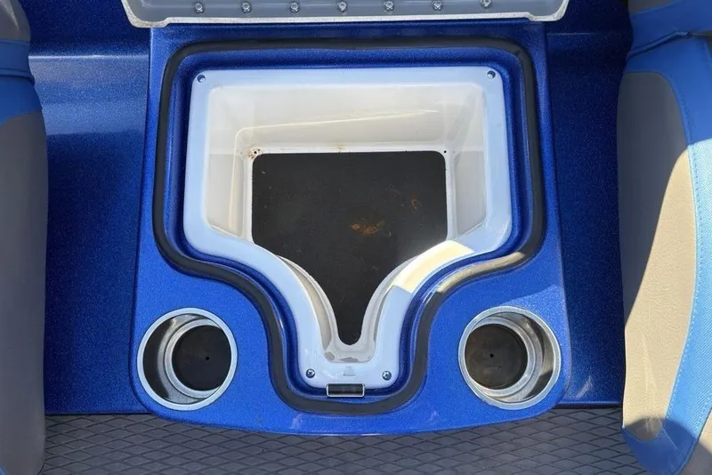 Slide: The Image of 2021 Caymas CX20 boat livewell with blue trim and cup holders. - 19