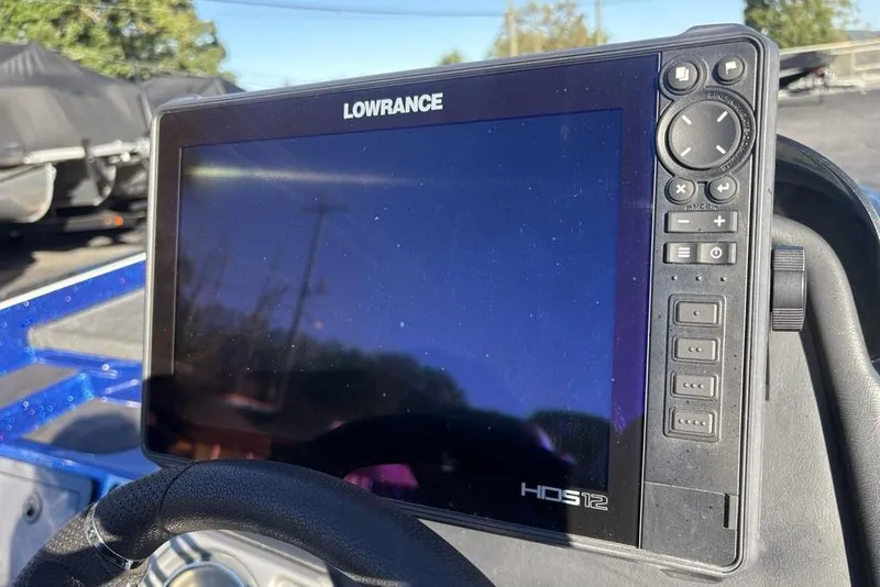 Slide: The Image of Lowrance HDS12 fishfinder on 2021 Caymas CX20 boat dashboard, sunny day. - 24