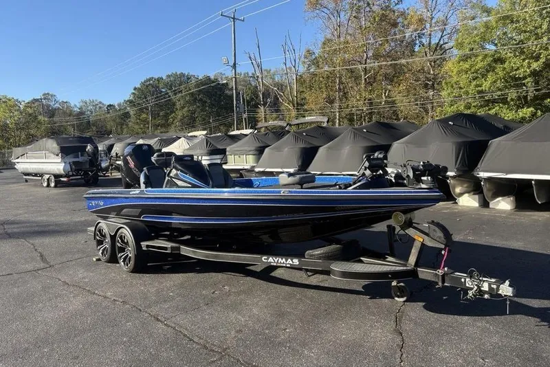 Slide: The Image of 2021 Caymas CX20 boat on trailer in outdoor storage area. - 4