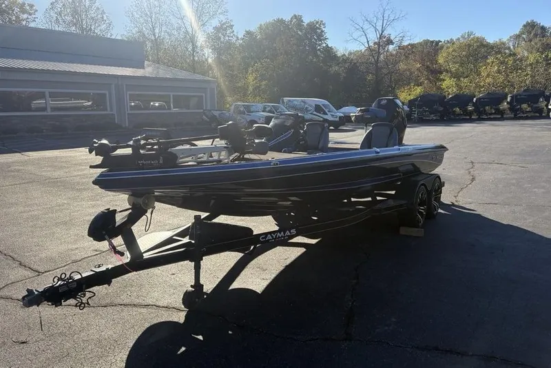 Slide: The Image of 2021 Caymas CX20 boat on trailer in outdoor dealership lot. - 41