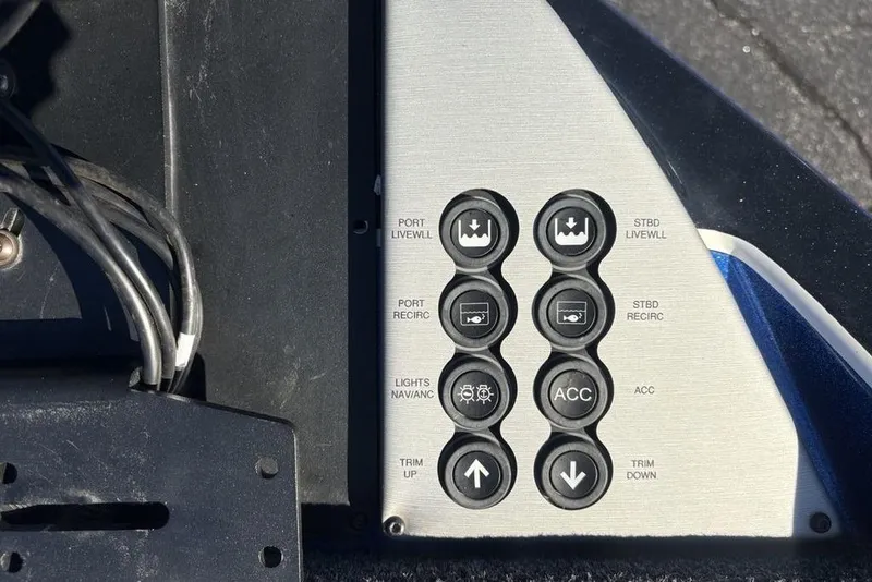 Slide: The Image of Control panel of a 2021 Caymas CX20 boat with labeled buttons and wiring. - 6