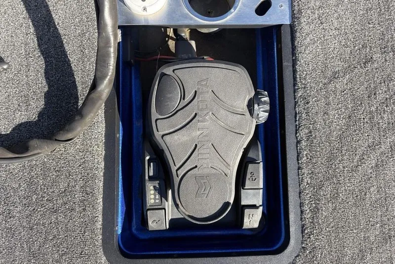 Slide: The Image of Foot pedal control on 2021 Caymas CX20 boat, featuring Minn Kota branding. - 8