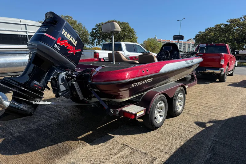 Slide: The Image of 2000 Stratos 20SS Extreme boat with Yamaha VMAX engine, parked on a trailer. - 12