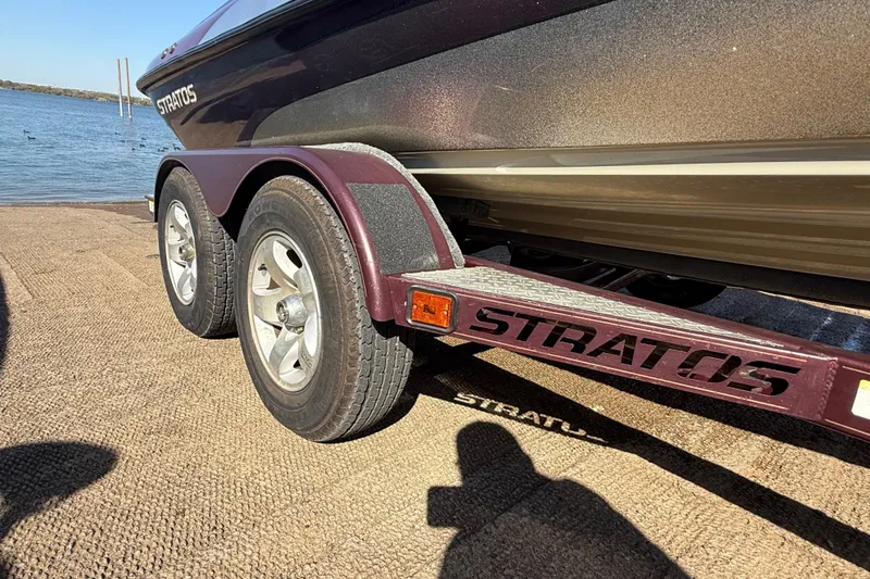 Slide: The Image of Interior view of a 2000 Stratos 20SS Extreme boat storage compartment. - 34