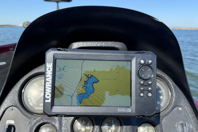 Slide: The Image of Open storage compartment in a 2000 Stratos 20SS Extreme boat. - 36