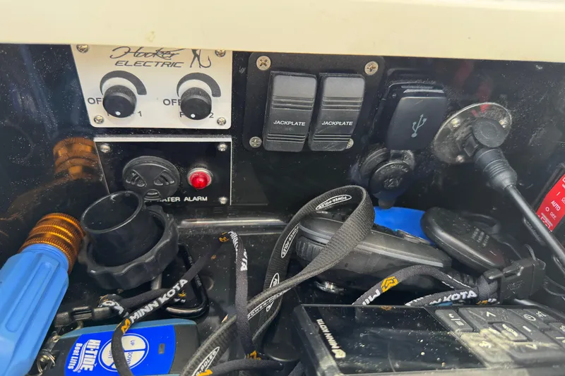 Slide: The Image of Control panel of 2024 Valhalla Boatworks V-29 Hybrid with switches and accessories. - 13