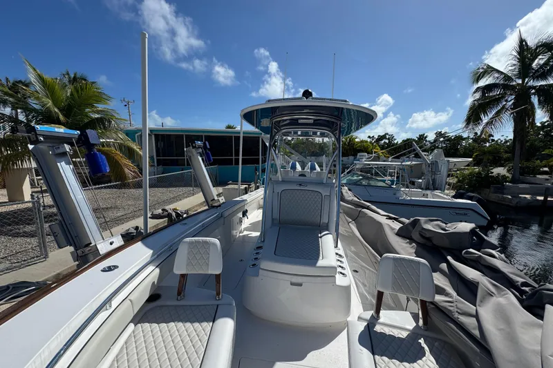 Slide: The Image of 2024 Valhalla Boatworks V-29 Hybrid, docked, featuring sleek design and luxurious seating. - 27