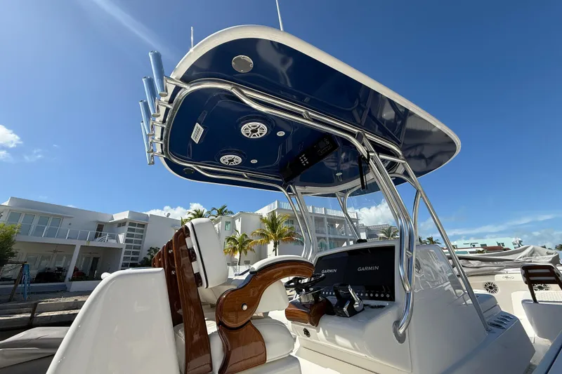 Slide: The Image of 2024 Valhalla Boatworks V-29 Hybrid helm with advanced Garmin navigation, sleek design, and modern amenities. - 29
