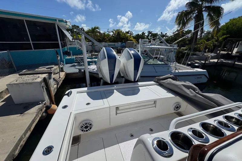 Slide: The Image of 2024 Valhalla Boatworks V-29 Hybrid docked, featuring dual outboard engines and sleek design. - 7