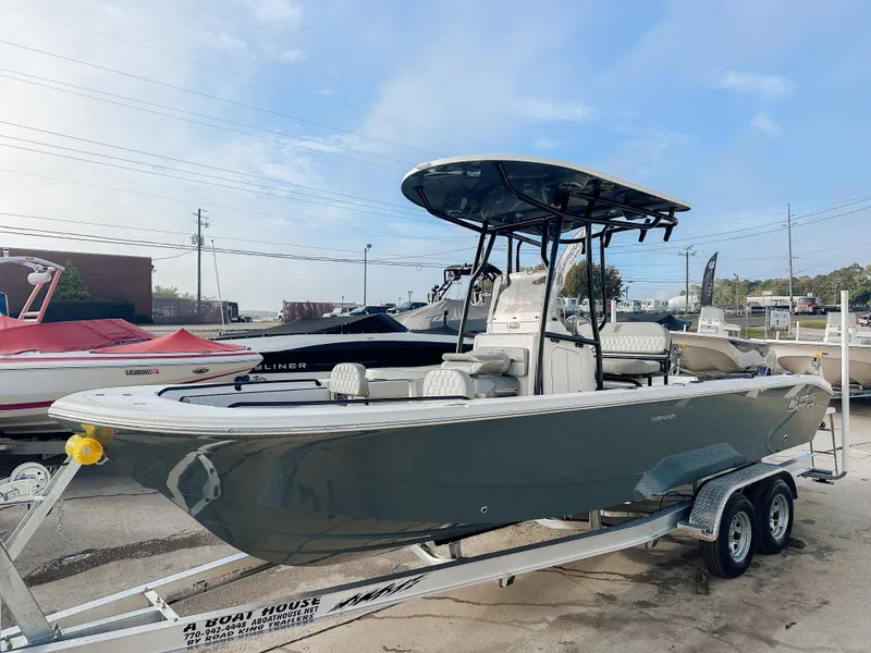 The Image of 2025 Carolina Skiff 24 Ultra Elite boat on trailer, parked outdoors. - 1