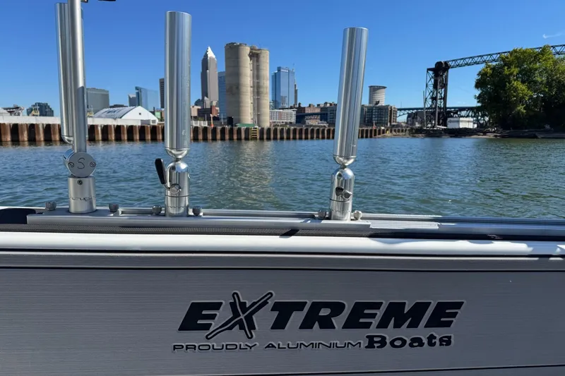 Slide: The Image of 2023 Extreme Boats 695 Game King on water, city skyline in background. - 26