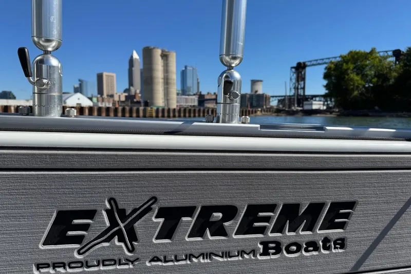 Slide: The Image of 2023 Extreme Boats 695 Game King with city skyline in background. - 34