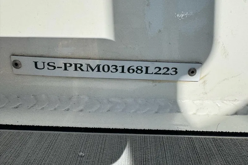 Slide: The Image of 2023 Extreme Boats 695 Game King hull identification number plate. - 35