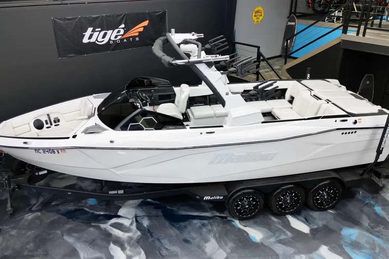 Slide: The Image of 2023 Malibu Wakesetter 26 LSV boat on display in showroom. - 7