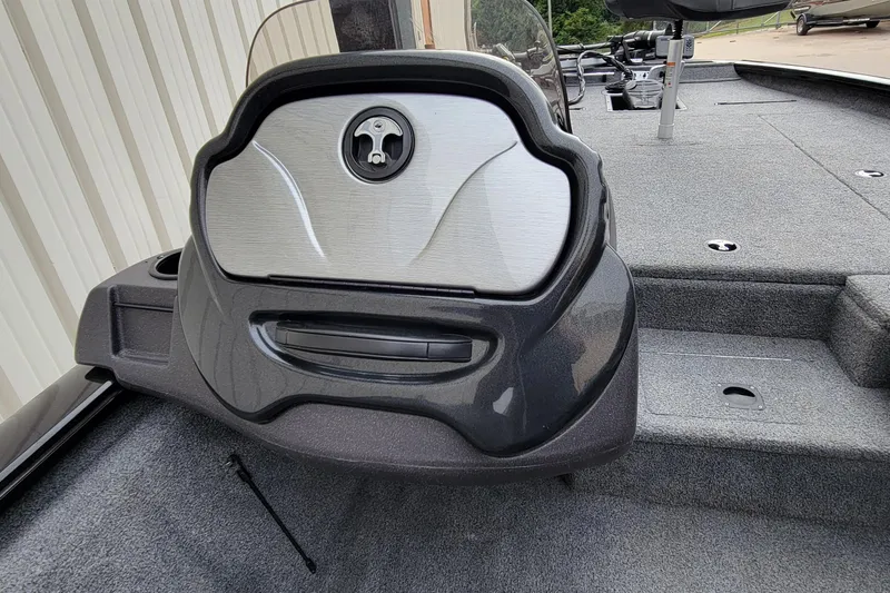 Slide: The Image of 2022 Bass Tracker PRO TEAM 190 boat interior with steering console and carpeted deck. - 25