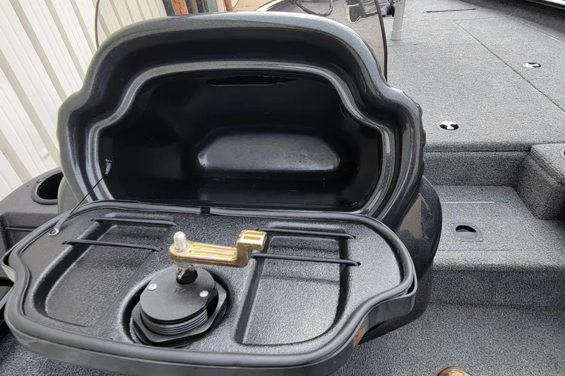 Slide: The Image of Open storage compartment in 2022 Bass Tracker PRO TEAM 190 boat. - 26