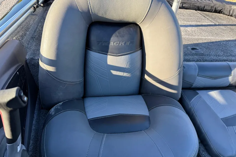 Slide: The Image of 2020 Tracker Pro Team 175 boat seat with gray upholstery and logo. - 25