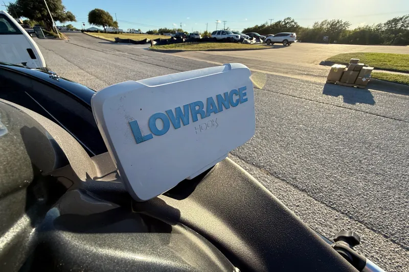 Slide: The Image of Lowrance fish finder on 2020 Tracker Pro Team 175 boat, parked on a sunny day. - 31