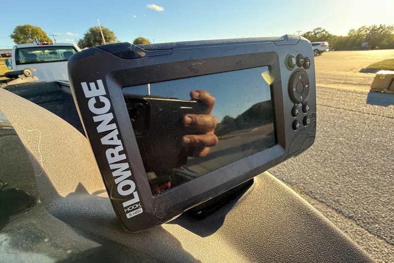 Slide: The Image of Lowrance fish finder on 2020 Tracker Pro Team 175 boat, sunny day background. - 32