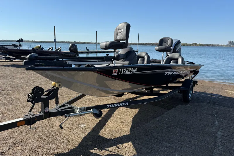 Slide: The Image of 2020 Tracker Pro Team 175 boat on trailer by the water, sunny day. - 42