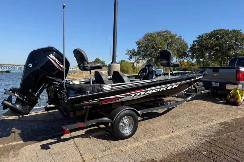 Slide: The Image of 2020 Tracker Pro Team 175 boat on trailer by lakeside, ready for launch. - 46