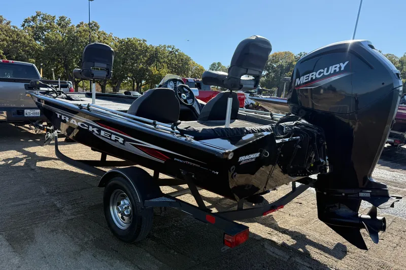 Slide: The Image of 2020 Tracker Pro Team 175 boat with Mercury engine on trailer in parking lot. - 51
