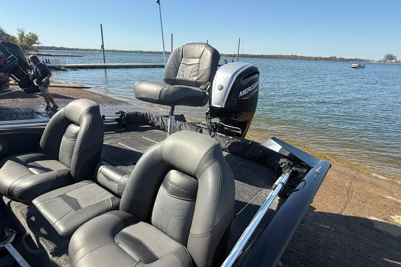 Slide: The Image of 2020 Tracker Pro Team 175 boat with Mercury engine by a lakeside dock. - 55