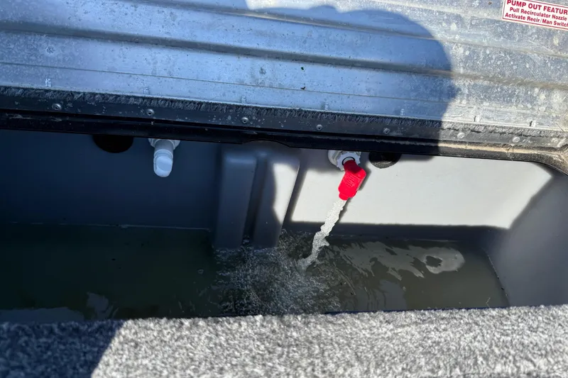 Slide: The Image of 2020 Tracker Pro Team 175 livewell with water flow and red valve. - 63