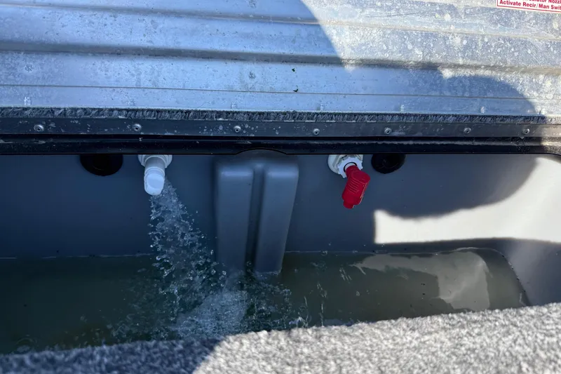 Slide: The Image of Livewell system in 2020 Tracker Pro Team 175 boat, water flowing through valve. - 64