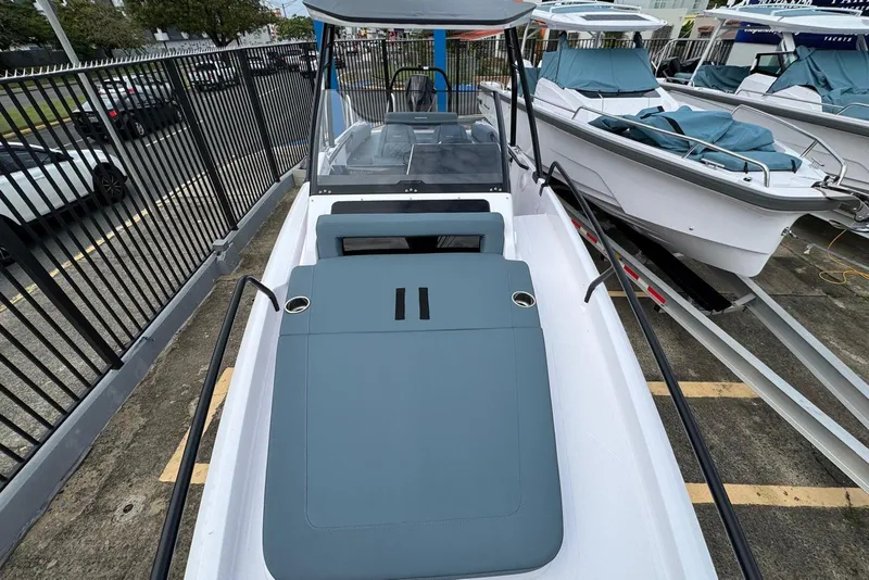 Slide: The Image of 2025 Axopar 25 Cross Top boat with sleek design and spacious deck layout. - 4