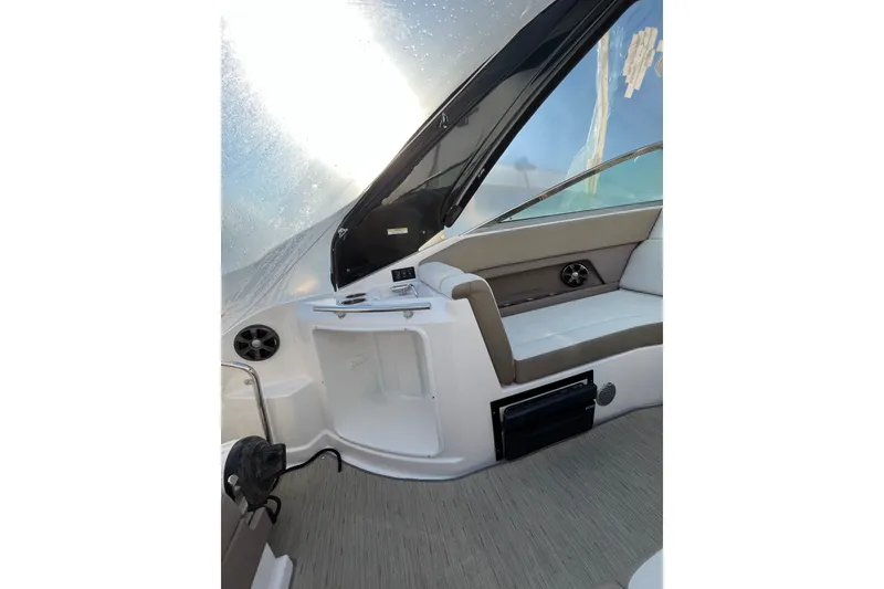 Slide: The Image of Interior of 2017 Regal 28 Express boat with TV and microwave. - 25