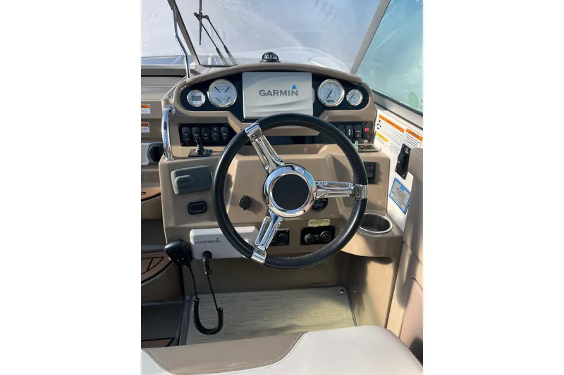 Slide: The Image of 2017 Regal 28 Express cabin interior with bed and window. - 26