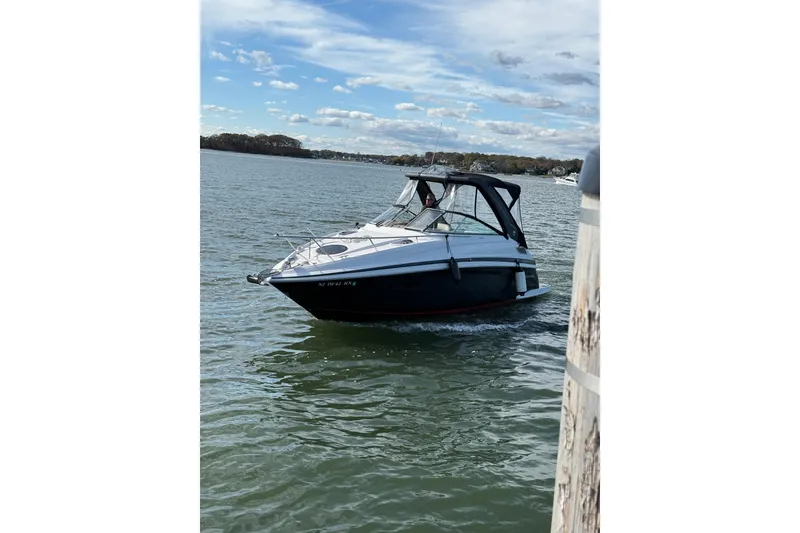 Slide: The Image of 2017 Regal 28 Express boat interior with beige seating and modern design. - 4