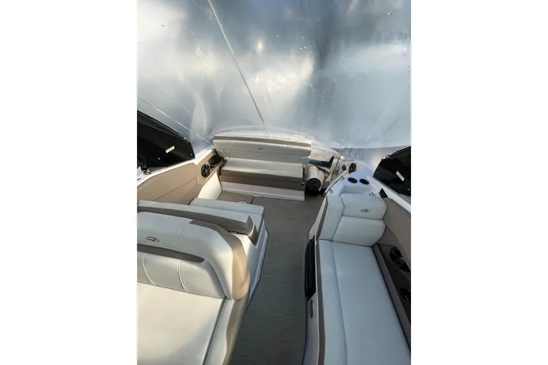 Slide: The Image of Interior of 2017 Regal 28 Express boat with steering wheel and seating. - 5